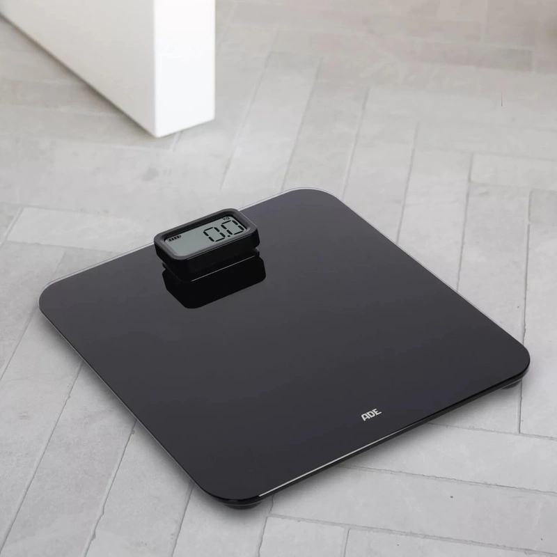 ADE - waga łazienkowa na dynamo, do 150 kg, 31 x 30 cm, czarna