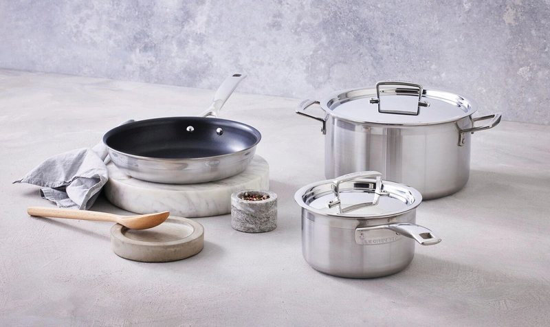 Le Creuset 3-ply dwie komplet garnków i patelnia