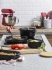 KitchenAid - Żeliwny owalny garnek z pokrywką 22 cm 3,3l