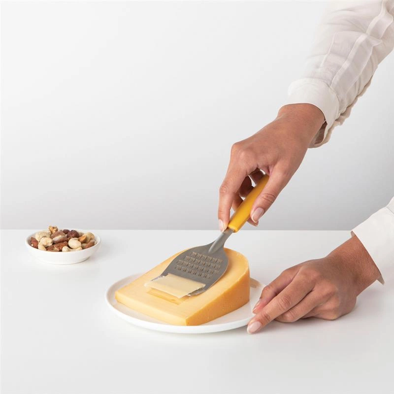 Brabantia - Nóż do sera z tarką Tasty+ żółty